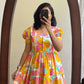 Ntroducing our latest  essential: the  Floral Dress. Crafted for comfort, this easy-breezy dress features a delightful  floral print. With a charming back knot detail and playful frill at the bottom, it’s perfect for sunny days