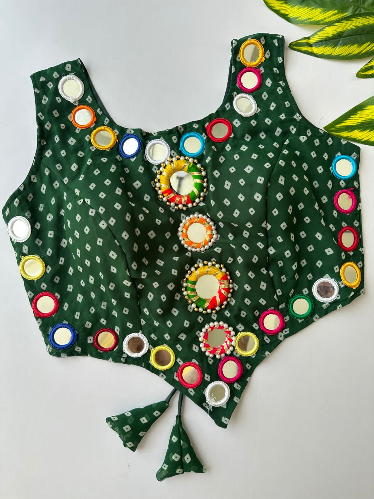 presenting new Navratri concept blouse with real hand mirror work*  Design name :- Navratri :21   FABRIC:-- Pure Georgette Bandhani with heavy mirror work