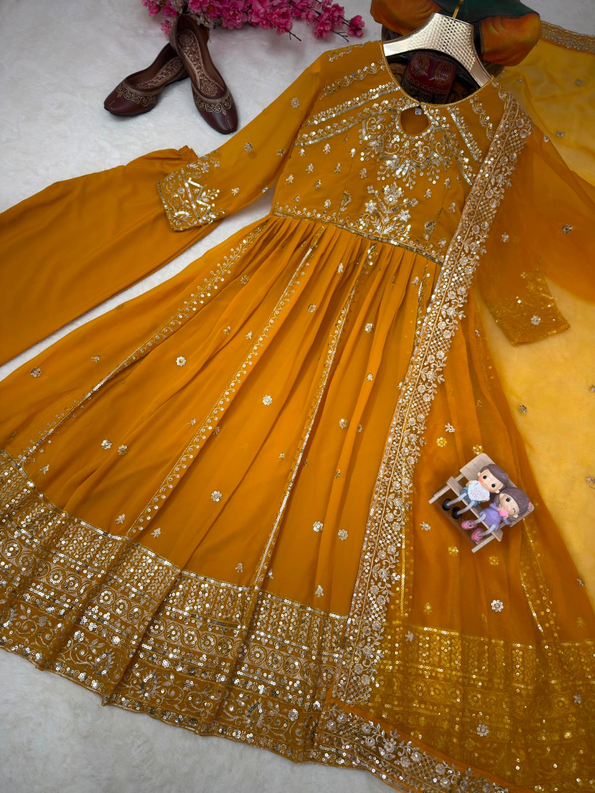 LAUNCHING NEW RED , RAMA , YELLOW DESIGNER ANARKALI GOWN ENHANCE THE BEAUTY OF YOUR WARDROBE WITH THIS NEWLY LAUNCHED ANARKALI GOWN SET