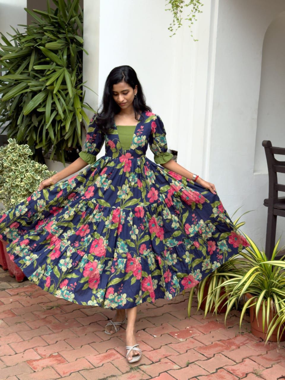 Ntroducing our latest  essential: the  Floral Dress. Crafted for comfort, this easy-breezy dress features a delightful  floral print. With a charming back knot detail and playful frill at the bottom, it’s perfect for sunny days