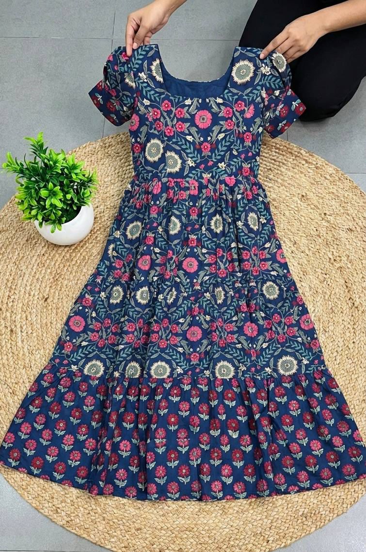 Ntroducing our latest  essential: the  Floral Dress. Crafted for comfort, this easy-breezy dress features a delightful  floral print. With a charming back knot detail and playful frill at the bottom, it’s perfect for sunny days