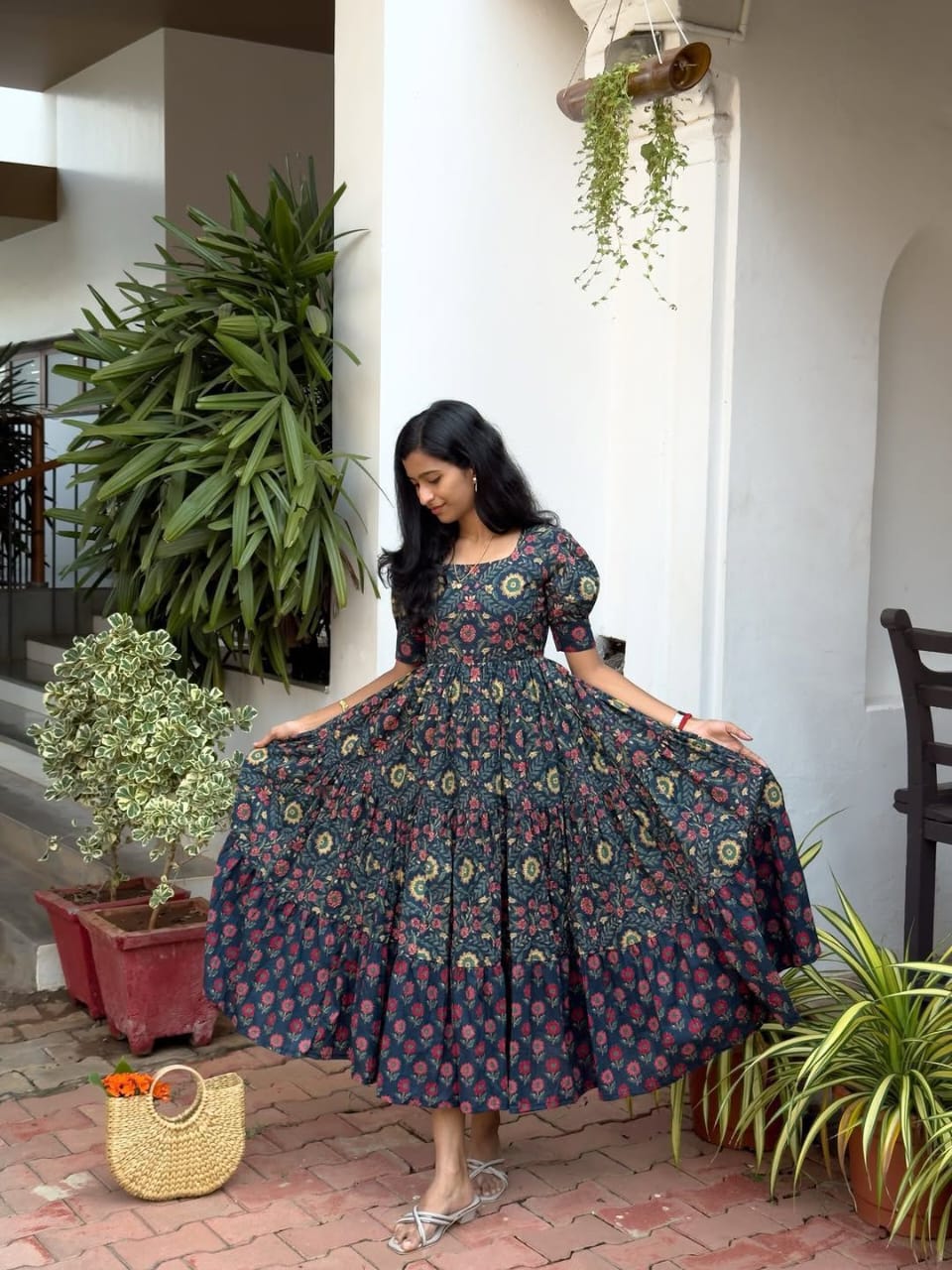 Ntroducing our latest  essential: the  Floral Dress. Crafted for comfort, this easy-breezy dress features a delightful  floral print. With a charming back knot detail and playful frill at the bottom, it’s perfect for sunny days
