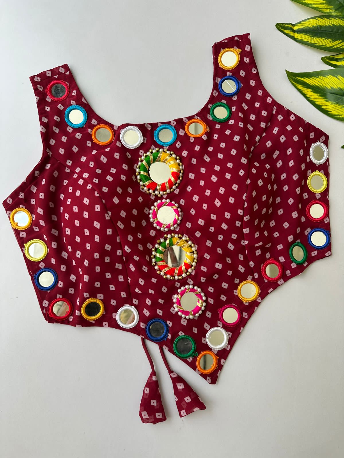 presenting new Navratri concept blouse with real hand mirror work*  Design name :- Navratri :21   FABRIC:-- Pure Georgette Bandhani with heavy mirror work