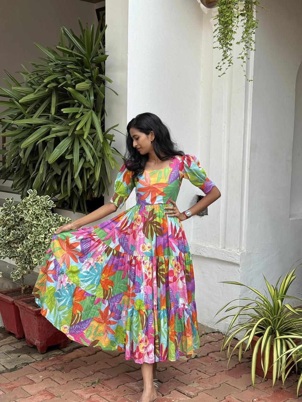 Ntroducing our latest  essential: the  Floral Dress. Crafted for comfort, this easy-breezy dress features a delightful  floral print. With a charming back knot detail and playful frill at the bottom, it’s perfect for sunny days