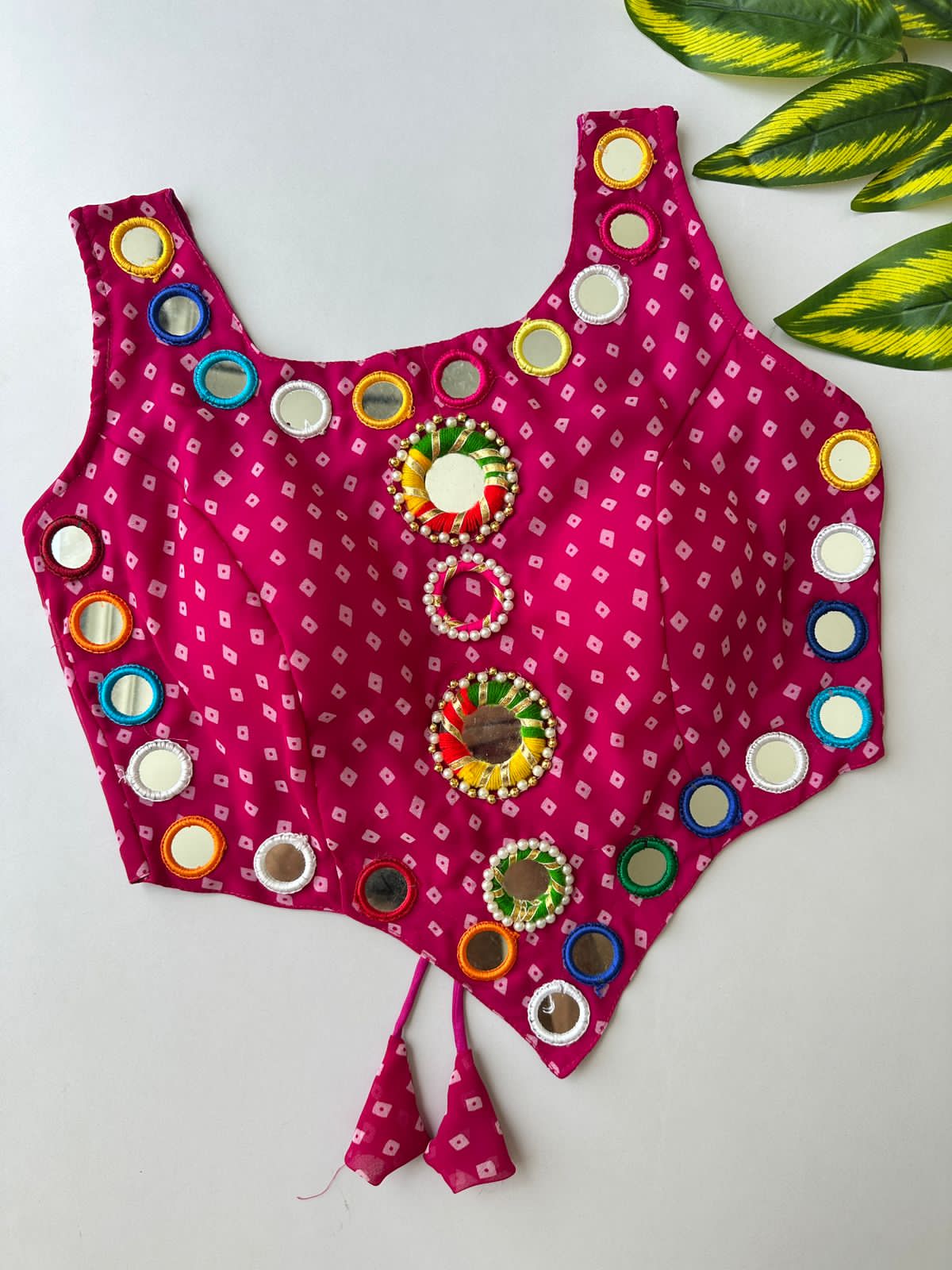 presenting new Navratri concept blouse with real hand mirror work*  Design name :- Navratri :21   FABRIC:-- Pure Georgette Bandhani with heavy mirror work