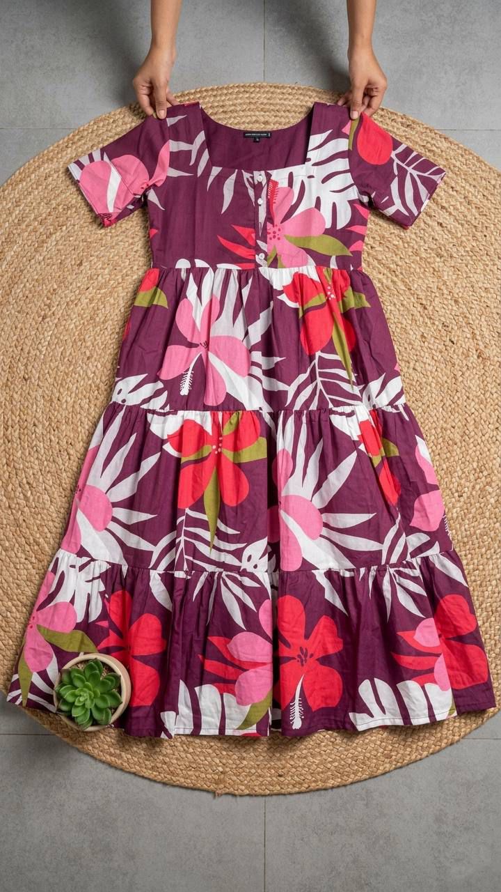 Ntroducing our latest  essential: the  Floral Dress. Crafted for comfort, this easy-breezy dress features a delightful  floral print. With a charming back knot detail and playful frill at the bottom, it’s perfect for sunny days